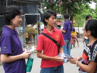 handing out tracts in Nong Doan